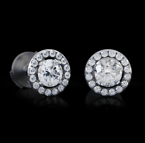 Montluc - Orbit No 2 diamond stud earrings , a triple excellent central diamond surrounded by an “orbit” of perfect round cut small diamonds.
