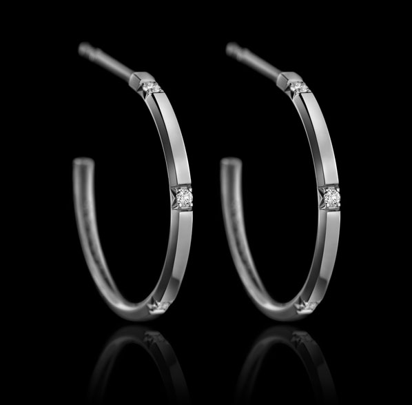 Montluc -Halo No 4. Diamond hoop earrings, each one set with 5 perfect, brilliant cut diamonds