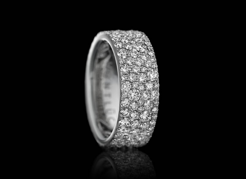 Montluc - Constellation No 1. Diamond ring “serti neige”: in this stunning band, diamonds are set playing on variations in diameter to completely cover the metal and to create a beautiful effect of organized chaos.